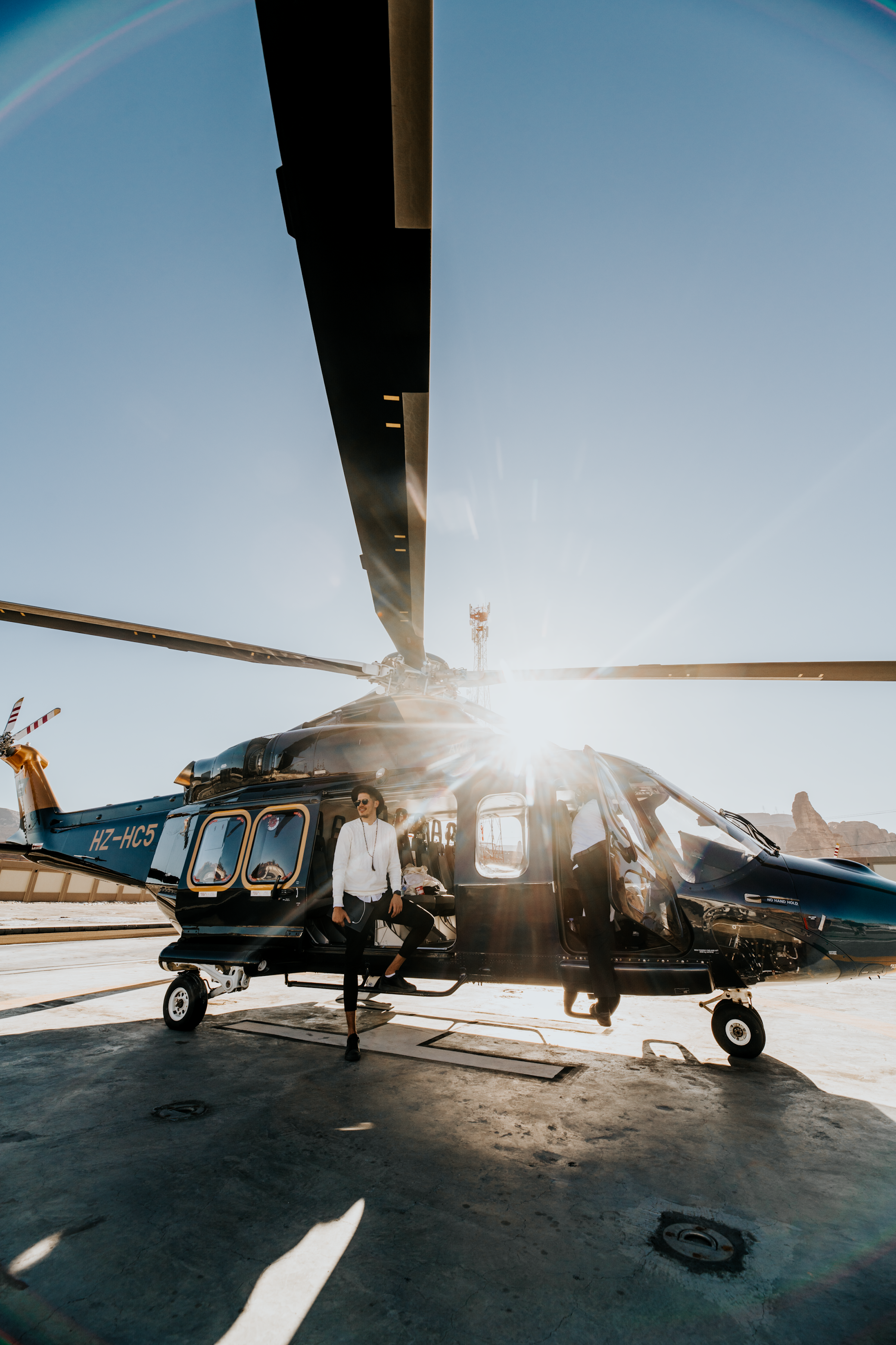 Boarding a private helicopter at golden hour